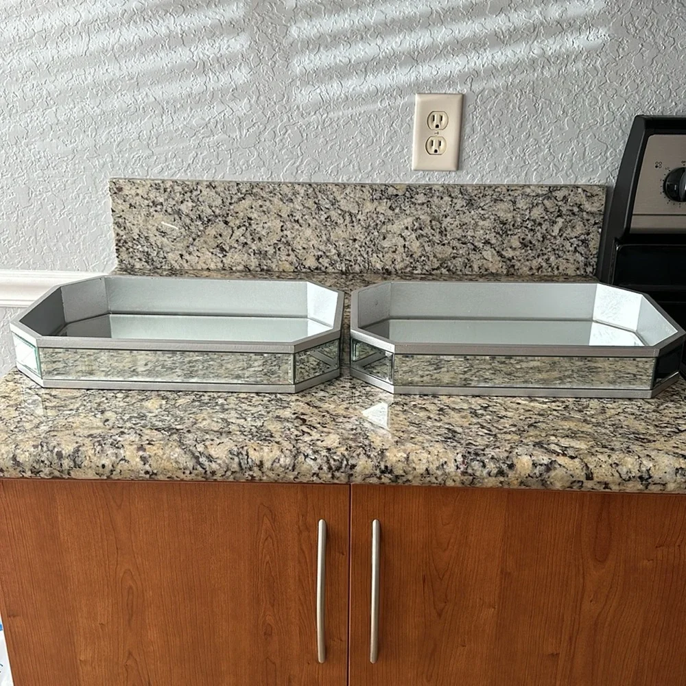 Two glass mirror trays, 16 inches wide 10 inches long